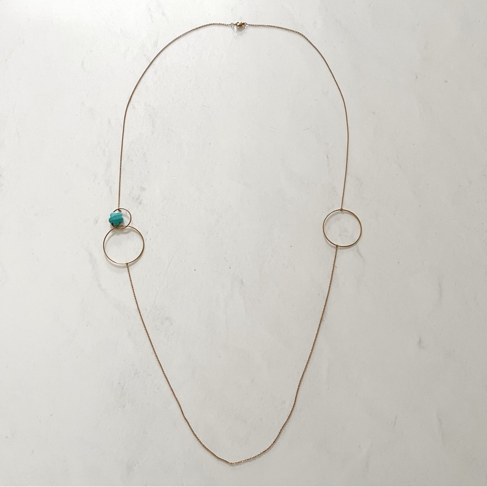 Delicate Gold Toned Necklace with Hoops & Dangling Flower Charm